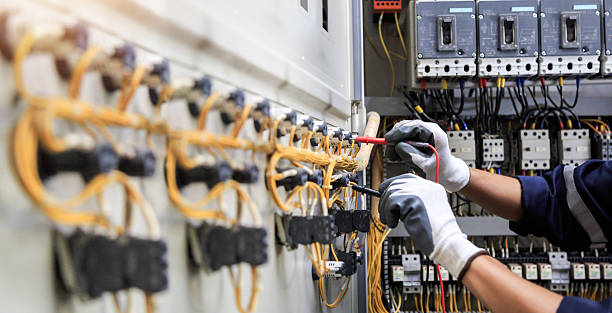 Professional Electrician technician working in Lely, FL